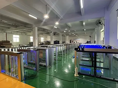 Structured pedestrian turnstile assembly line with organized component inventory, backing our 10-year critical spare parts lifecycle supply guarantee.